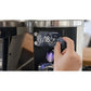 White Mahlkönig E80W GbS grinder adjustment in operation